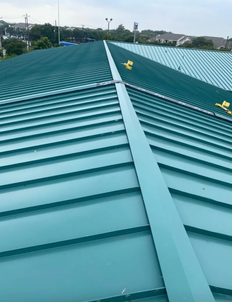 Green commercial metal roof ridge and valley for Metal Roof Repair in Fort Mill