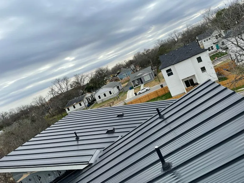 Standing seam metal roof panels with vents for Skylight Repair in Fort Mill